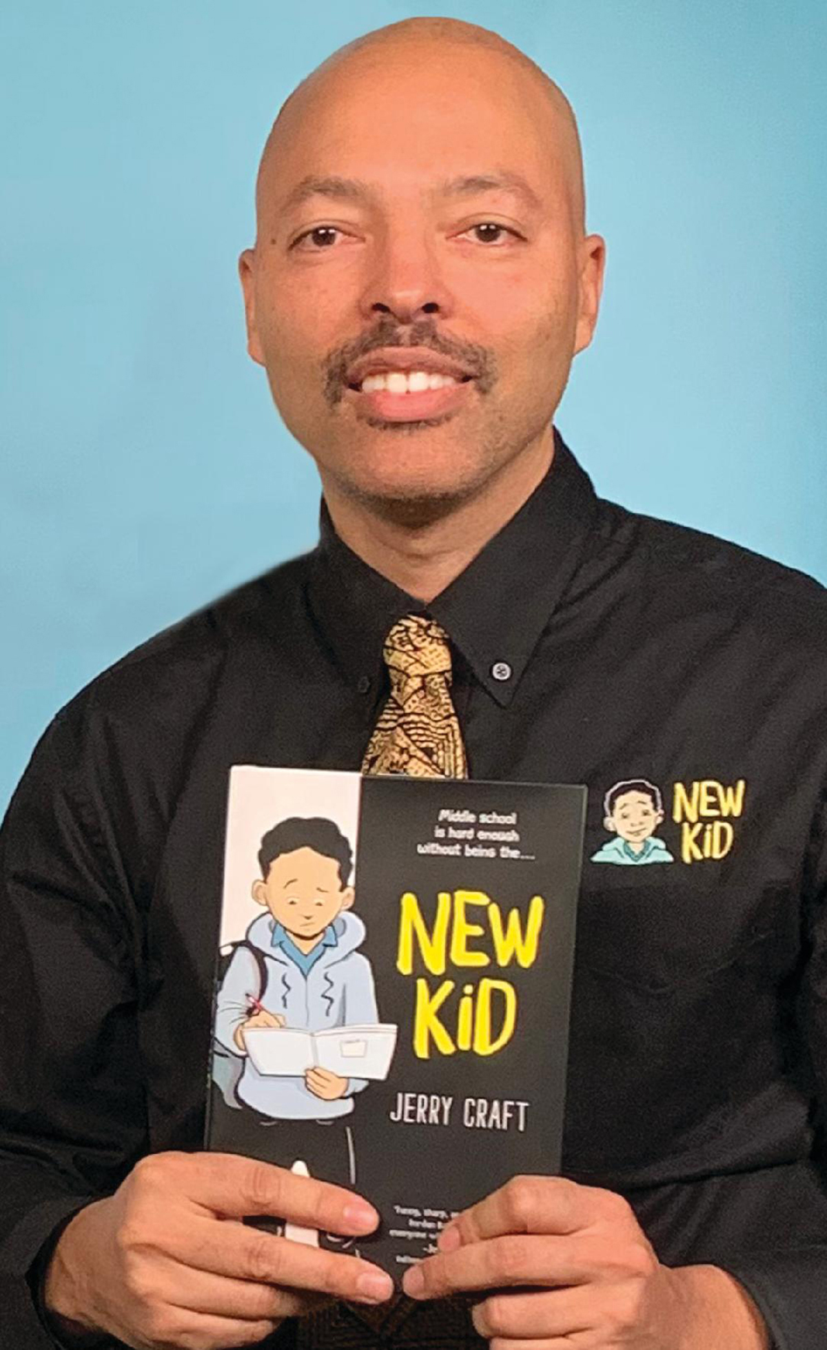 Jerry Craft with his graphic novel New Kid